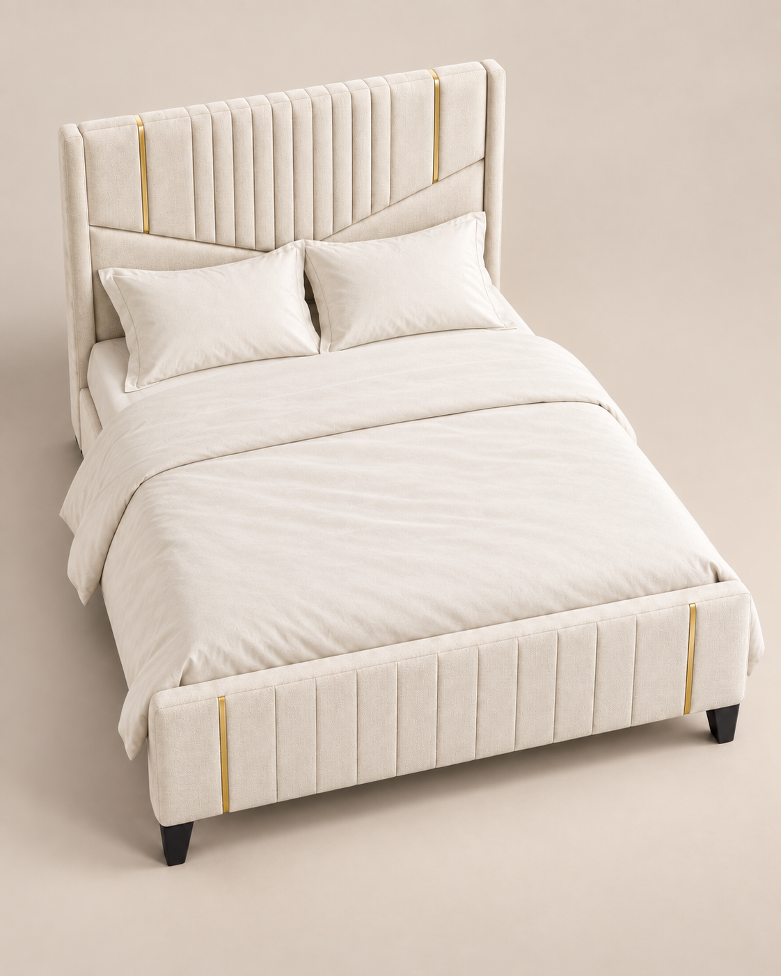 Cream upholstered bed handcrafted in Kenya, with a channelled wingback headboard, brass-toned strips and dark tapered legs