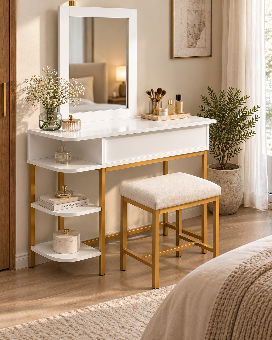 White dressing table handcrafted in Kenya with framed mirror, drawer, tiered corner shelves, brass-toned legs and cream stool