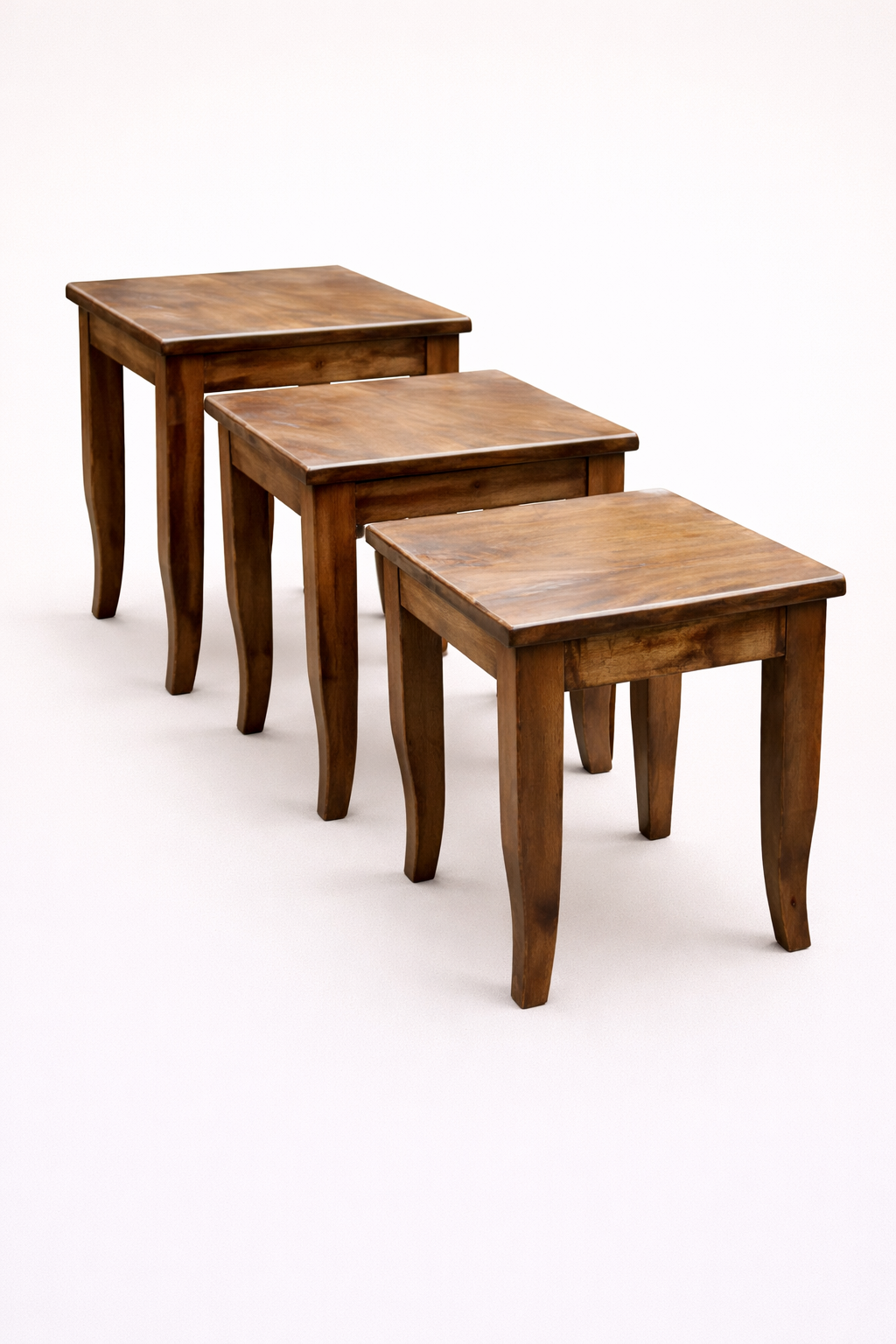 Jua Meru Oak Nest of Stools — handcrafted African furniture by Rodis and woods land furnitures  in Kenya