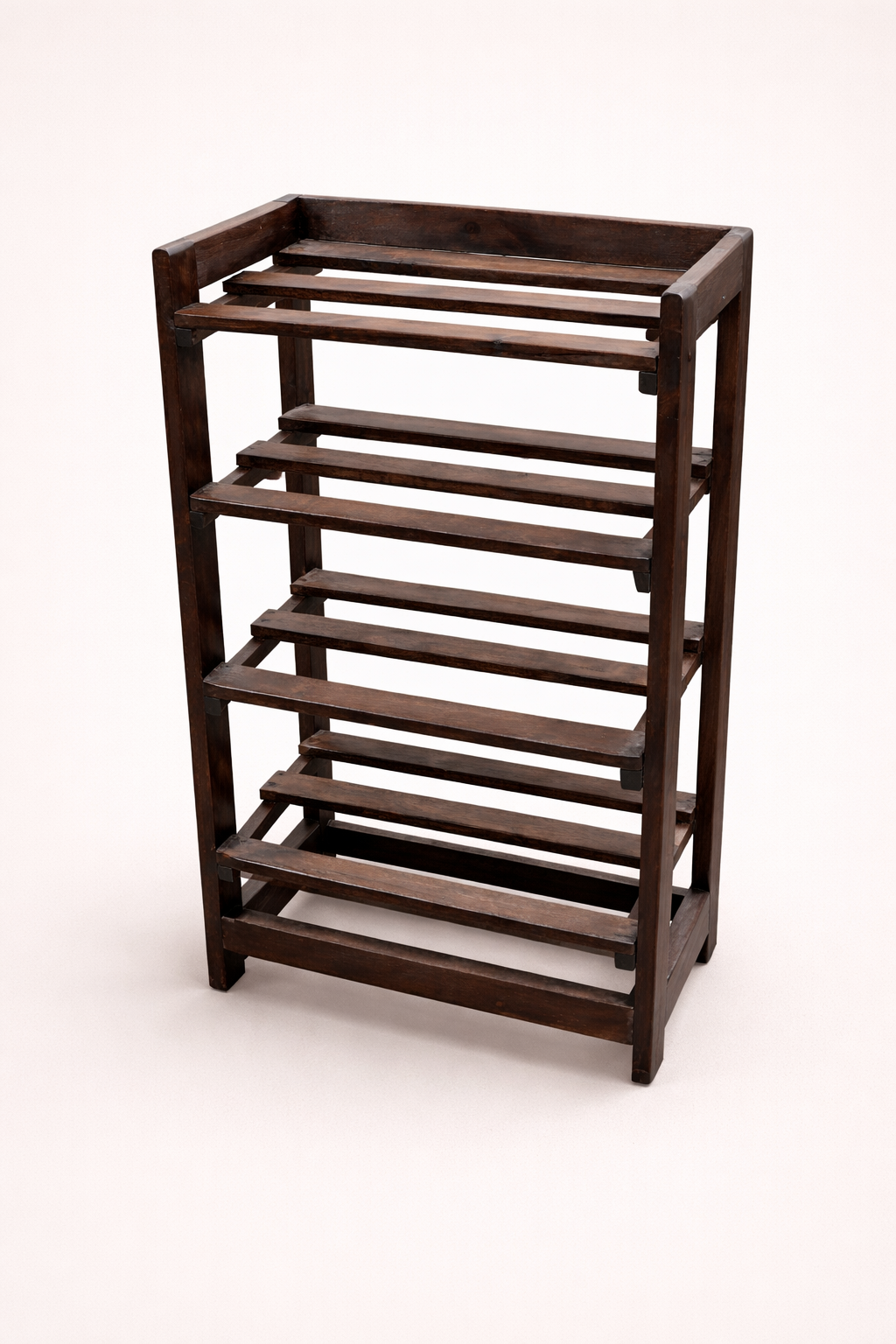 Jua Mukui Wood Shoerack — handcrafted African furniture by Rodis and woods land furnitures  in Kenya